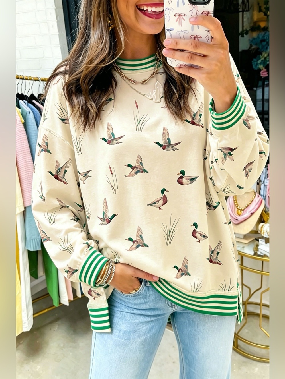 Whimsical Duck Print Sweatshirt with Striped Trim